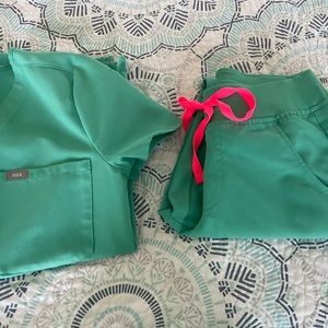 Figs 2 pair scrub sets; surgical green. Set with pink ties have never been worn